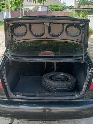 Черный Дэу Ланос, объемом двигателя 1.5 л и пробегом 328 тыс. км за 2700 $, фото 11 на Automoto.ua