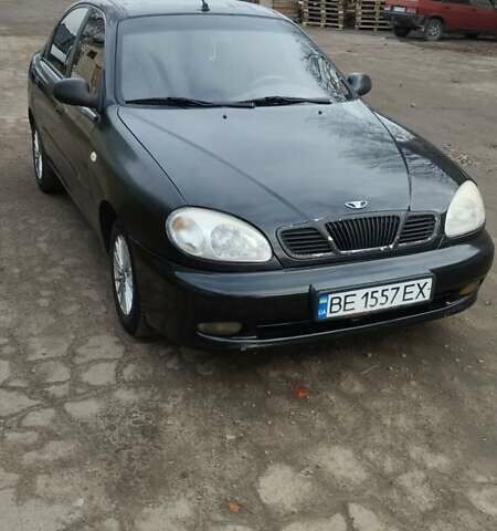 Черный Дэу Ланос, объемом двигателя 1.5 л и пробегом 244 тыс. км за 1650 $, фото 1 на Automoto.ua