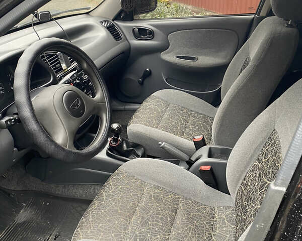 Черный Дэу Ланос, объемом двигателя 1.5 л и пробегом 160 тыс. км за 2800 $, фото 9 на Automoto.ua