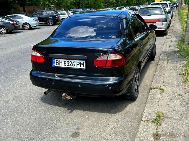 Черный Дэу Ланос, объемом двигателя 1.5 л и пробегом 123 тыс. км за 2200 $, фото 3 на Automoto.ua