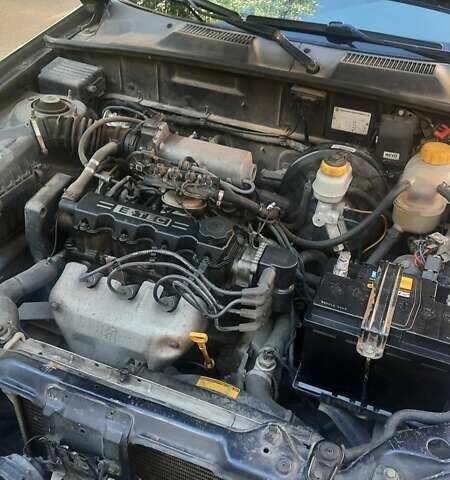 Черный Дэу Ланос, объемом двигателя 1.5 л и пробегом 110 тыс. км за 1500 $, фото 4 на Automoto.ua