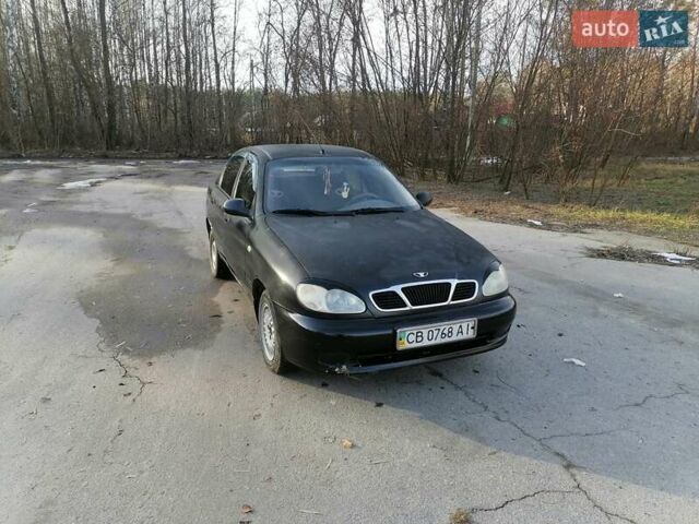 Черный Дэу Ланос, объемом двигателя 1.5 л и пробегом 300 тыс. км за 1650 $, фото 3 на Automoto.ua