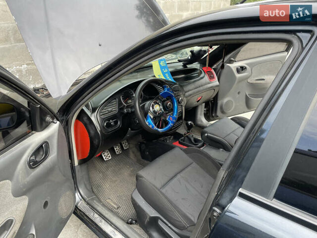 Чорний Деу Ланос, об'ємом двигуна 1.5 л та пробігом 130 тис. км за 2700 $, фото 12 на Automoto.ua
