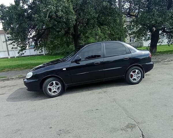 Черный Дэу Ланос, объемом двигателя 1.5 л и пробегом 202 тыс. км за 3250 $, фото 2 на Automoto.ua