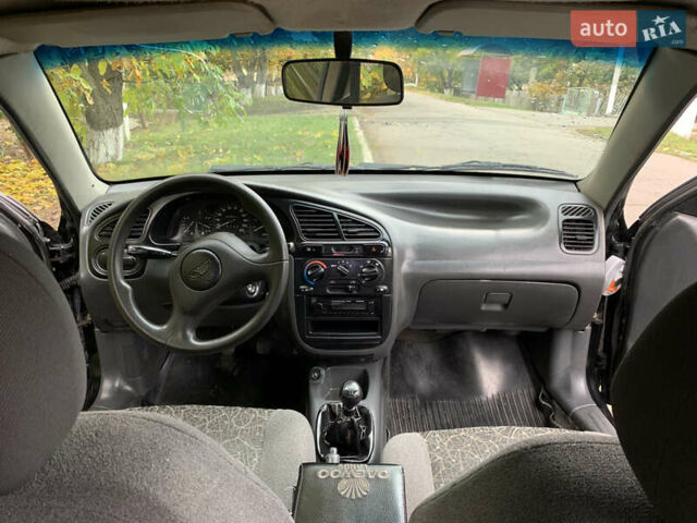 Черный Дэу Ланос, объемом двигателя 1.5 л и пробегом 263 тыс. км за 1830 $, фото 9 на Automoto.ua