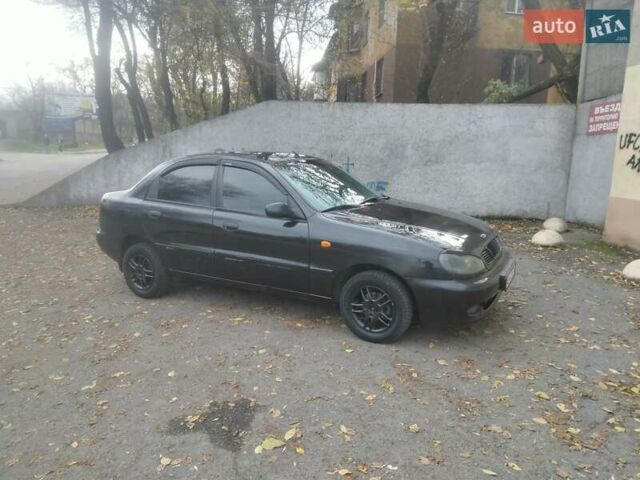 Черный Дэу Ланос, объемом двигателя 1.5 л и пробегом 200 тыс. км за 1550 $, фото 1 на Automoto.ua