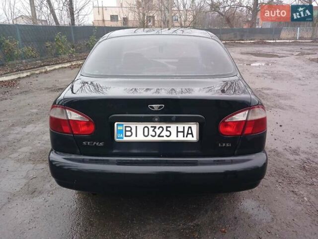 Черный Дэу Ланос, объемом двигателя 1.35 л и пробегом 122 тыс. км за 1699 $, фото 5 на Automoto.ua
