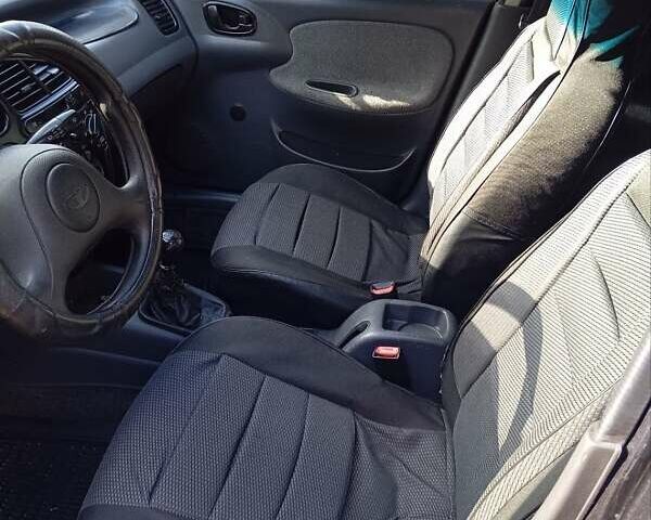 Деу Ланос 2006 у Буче на Automoto.ua Чорний Деу Ланос, об'ємом двигуна 1.5 л та пробігом 410 тис. км за 2250 $, фото 13 на Automoto.ua