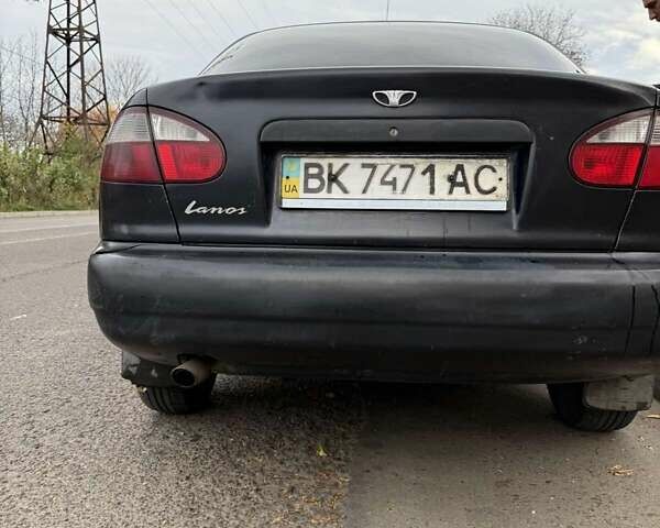 Черный Дэу Ланос, объемом двигателя 1.5 л и пробегом 100 тыс. км за 900 $, фото 19 на Automoto.ua