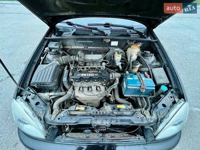 Черный Дэу Ланос, объемом двигателя 1.5 л и пробегом 653 тыс. км за 2199 $, фото 13 на Automoto.ua