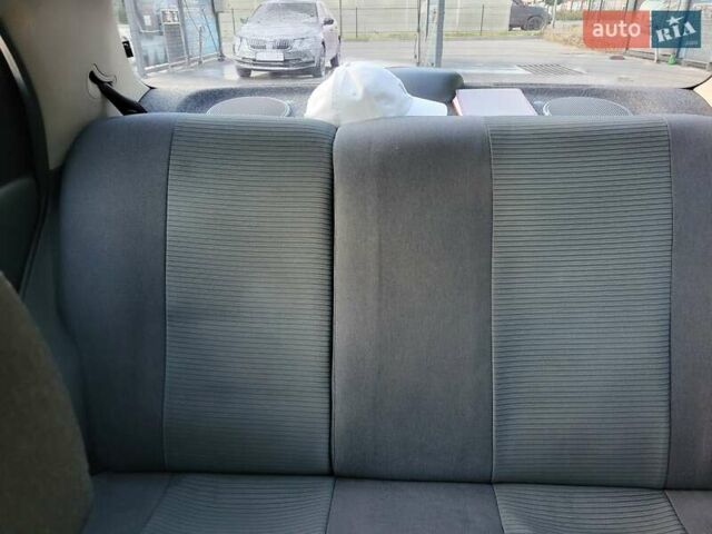 Черный Дэу Ланос, объемом двигателя 1.5 л и пробегом 215 тыс. км за 2900 $, фото 10 на Automoto.ua