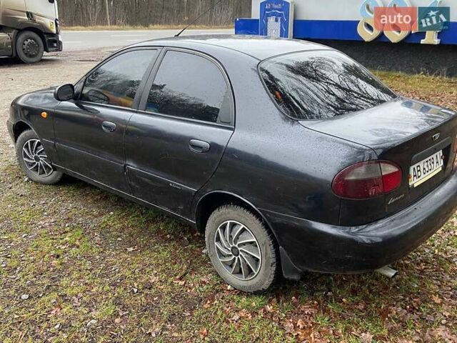 Черный Дэу Ланос, объемом двигателя 0 л и пробегом 201 тыс. км за 1500 $, фото 1 на Automoto.ua