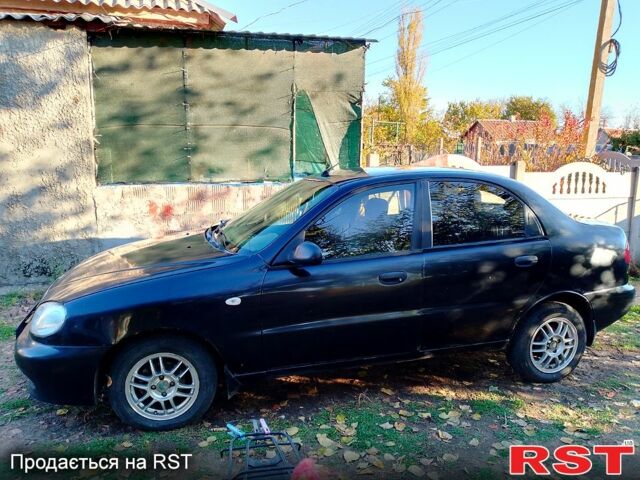 Черный Дэу Ланос, объемом двигателя 1.5 л и пробегом 247 тыс. км за 2100 $, фото 7 на Automoto.ua