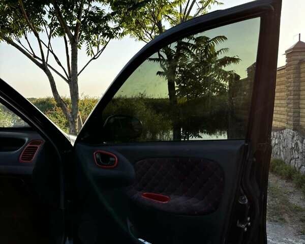 Деу Ланос 2006 у Новомосковске на Automoto.ua Чорний Деу Ланос, об'ємом двигуна 1.5 л та пробігом 328 тис. км за 1800 $, фото 9 на Automoto.ua