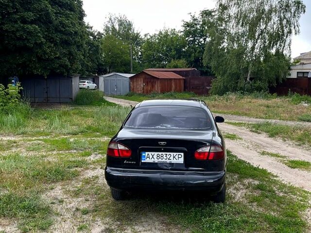Черный Дэу Ланос, объемом двигателя 1.5 л и пробегом 250 тыс. км за 1400 $, фото 3 на Automoto.ua