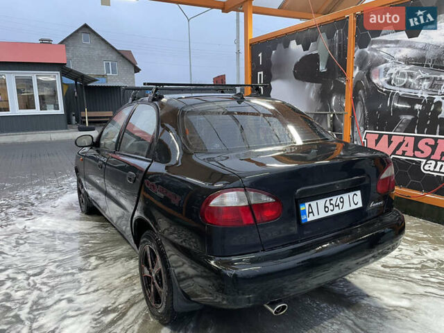 Черный Дэу Ланос, объемом двигателя 1.5 л и пробегом 145 тыс. км за 1799 $, фото 1 на Automoto.ua