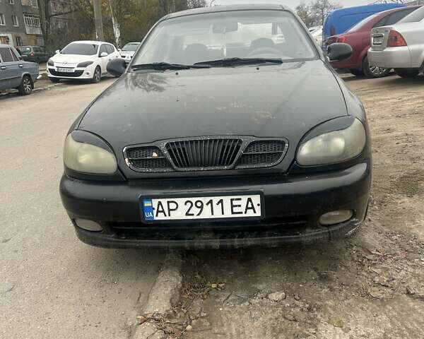 Черный Дэу Ланос, объемом двигателя 1.5 л и пробегом 225 тыс. км за 1200 $, фото 1 на Automoto.ua