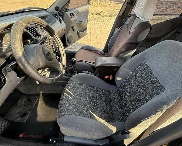 Черный Дэу Ланос, объемом двигателя 1.5 л и пробегом 163 тыс. км за 2900 $, фото 14 на Automoto.ua