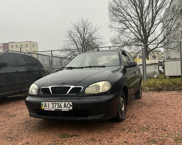 Черный Дэу Ланос, объемом двигателя 1.5 л и пробегом 296 тыс. км за 1000 $, фото 6 на Automoto.ua