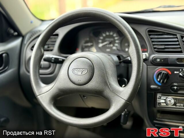 Черный Дэу Ланос, объемом двигателя 1.5 л и пробегом 58 тыс. км за 3700 $, фото 9 на Automoto.ua