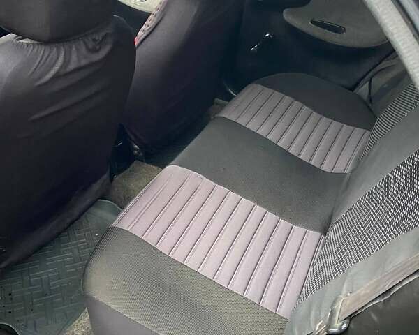 Черный Дэу Ланос, объемом двигателя 0 л и пробегом 201 тыс. км за 1500 $, фото 8 на Automoto.ua