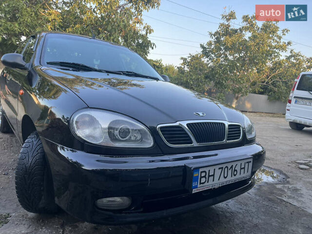 Черный Дэу Ланос, объемом двигателя 1.5 л и пробегом 160 тыс. км за 2800 $, фото 1 на Automoto.ua