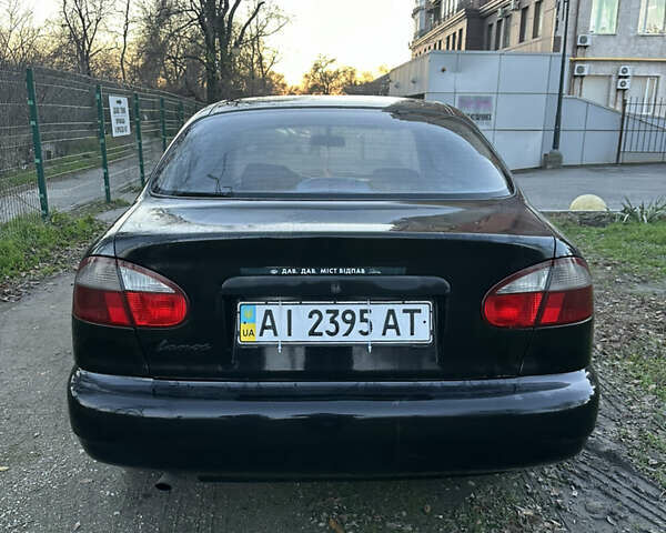 Черный Дэу Ланос, объемом двигателя 1.5 л и пробегом 270 тыс. км за 1900 $, фото 5 на Automoto.ua