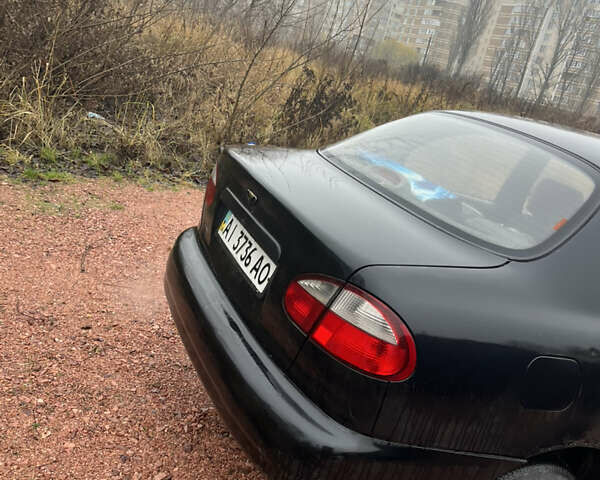 Черный Дэу Ланос, объемом двигателя 1.5 л и пробегом 298 тыс. км за 1000 $, фото 7 на Automoto.ua