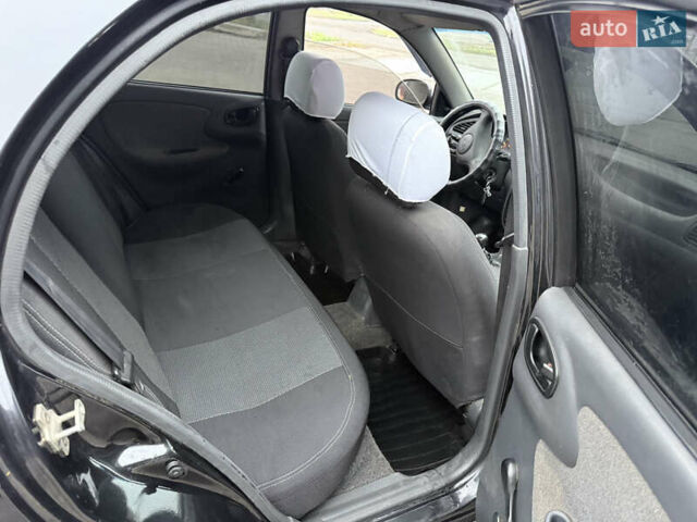 Черный Дэу Ланос, объемом двигателя 1.5 л и пробегом 251 тыс. км за 2550 $, фото 6 на Automoto.ua
