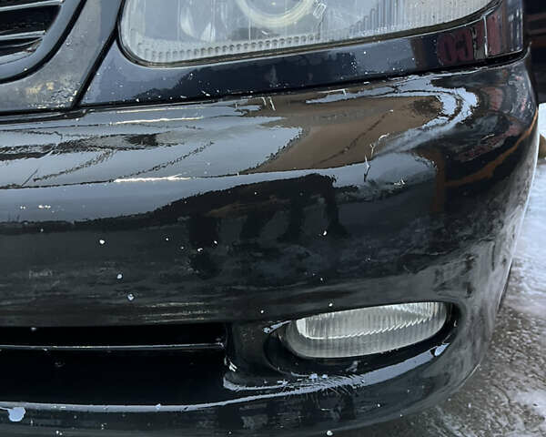 Черный Дэу Ланос, объемом двигателя 1.5 л и пробегом 145 тыс. км за 1799 $, фото 7 на Automoto.ua