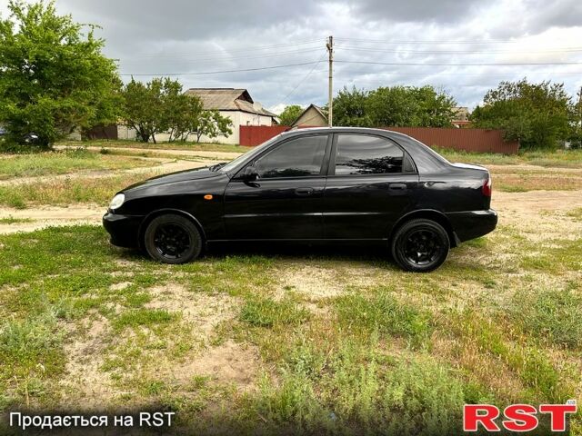 Черный Дэу Ланос, объемом двигателя 1.5 л и пробегом 250 тыс. км за 1400 $, фото 1 на Automoto.ua