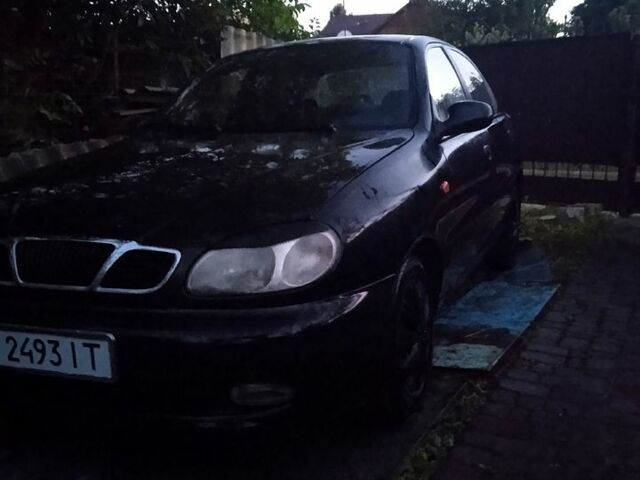 Черный Дэу Ланос, объемом двигателя 1.5 л и пробегом 274 тыс. км за 2000 $, фото 4 на Automoto.ua