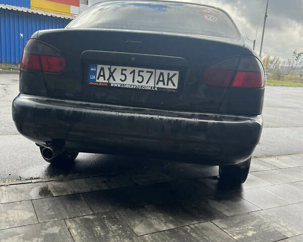 Чорний Деу Ланос, об'ємом двигуна 1.5 л та пробігом 213 тис. км за 1700 $, фото 4 на Automoto.ua