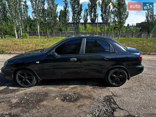 Черный Дэу Ланос, объемом двигателя 1.5 л и пробегом 220 тыс. км за 3100 $, фото 4 на Automoto.ua