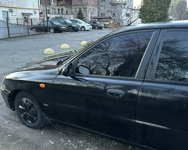 Черный Дэу Ланос, объемом двигателя 1.5 л и пробегом 270 тыс. км за 1900 $, фото 7 на Automoto.ua