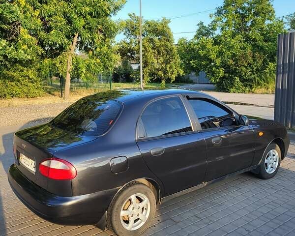 Черный Дэу Ланос, объемом двигателя 1.5 л и пробегом 215 тыс. км за 2900 $, фото 6 на Automoto.ua