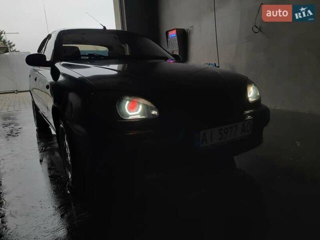 Черный Дэу Ланос, объемом двигателя 1.5 л и пробегом 208 тыс. км за 3000 $, фото 2 на Automoto.ua