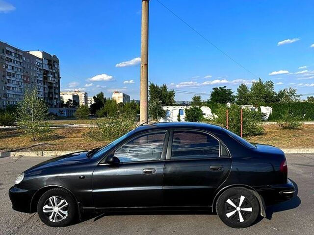 Черный Дэу Ланос, объемом двигателя 1.5 л и пробегом 310 тыс. км за 2500 $, фото 2 на Automoto.ua