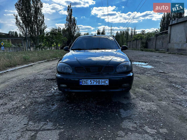 Черный Дэу Ланос, объемом двигателя 1.5 л и пробегом 220 тыс. км за 3100 $, фото 7 на Automoto.ua
