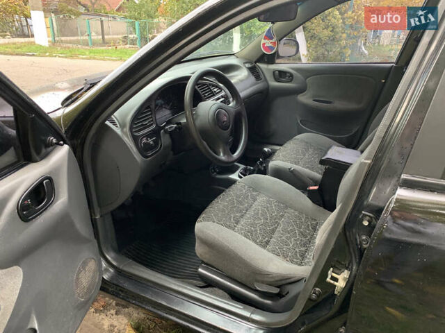 Черный Дэу Ланос, объемом двигателя 1.5 л и пробегом 263 тыс. км за 1830 $, фото 5 на Automoto.ua