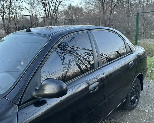 Черный Дэу Ланос, объемом двигателя 1.5 л и пробегом 270 тыс. км за 1900 $, фото 8 на Automoto.ua