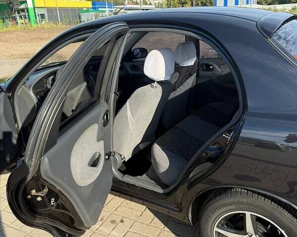 Черный Дэу Ланос, объемом двигателя 1.5 л и пробегом 163 тыс. км за 2900 $, фото 20 на Automoto.ua