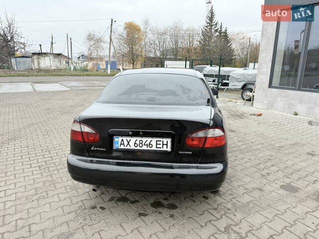 Черный Дэу Ланос, объемом двигателя 1.5 л и пробегом 251 тыс. км за 2550 $, фото 2 на Automoto.ua