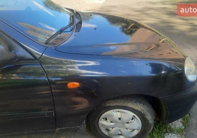 Черный Дэу Ланос, объемом двигателя 1.5 л и пробегом 110 тыс. км за 1500 $, фото 11 на Automoto.ua