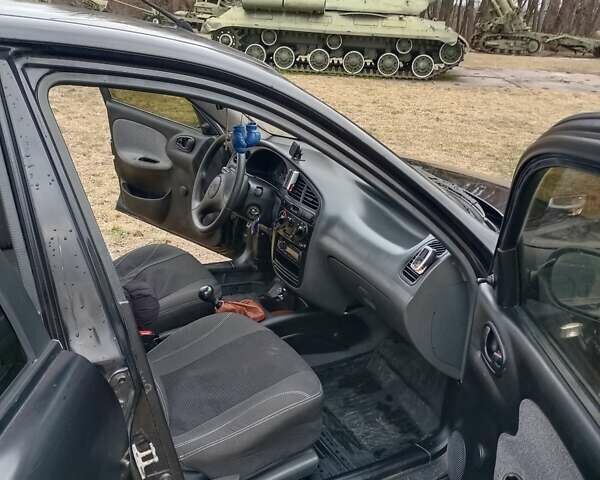 Чорний Деу Ланос, об'ємом двигуна 1.5 л та пробігом 286 тис. км за 2800 $, фото 14 на Automoto.ua