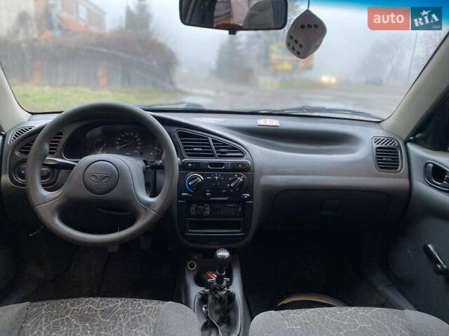 Черный Дэу Ланос, объемом двигателя 1.5 л и пробегом 231 тыс. км за 1750 $, фото 7 на Automoto.ua