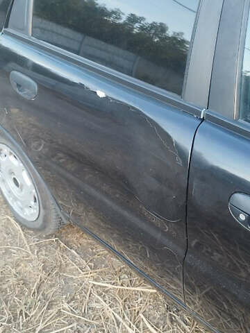 Черный Дэу Ланос, объемом двигателя 1.5 л и пробегом 147 тыс. км за 1800 $, фото 1 на Automoto.ua