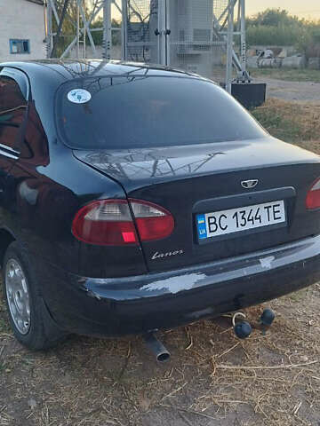 Черный Дэу Ланос, объемом двигателя 1.5 л и пробегом 147 тыс. км за 1800 $, фото 2 на Automoto.ua