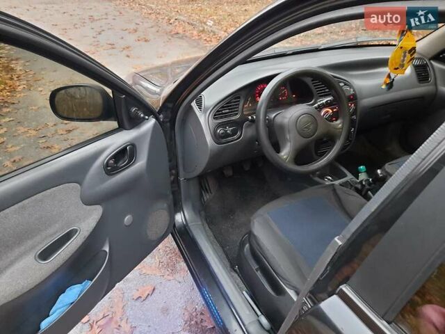 Черный Дэу Ланос, объемом двигателя 1.5 л и пробегом 208 тыс. км за 3000 $, фото 8 на Automoto.ua