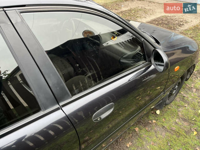 Черный Дэу Ланос, объемом двигателя 1.5 л и пробегом 140 тыс. км за 2500 $, фото 7 на Automoto.ua